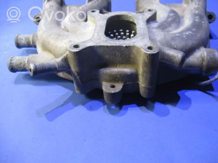 Volkswagen Golf II Intake manifold 038129713K