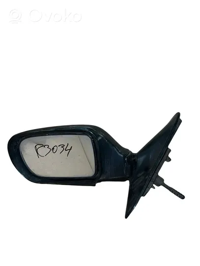 Mazda 323 Manual wing mirror E11011164