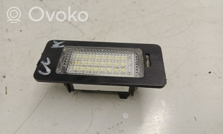 BMW X5 E70 Lampa oświetlenia tylnej tablicy rejestracyjnej 