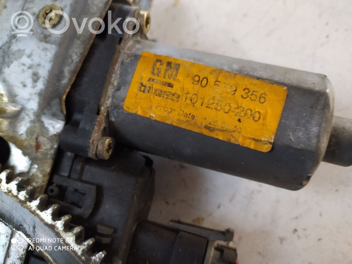 Opel Zafira A Elektryczny podnośnik szyby drzwi przednich 90579572