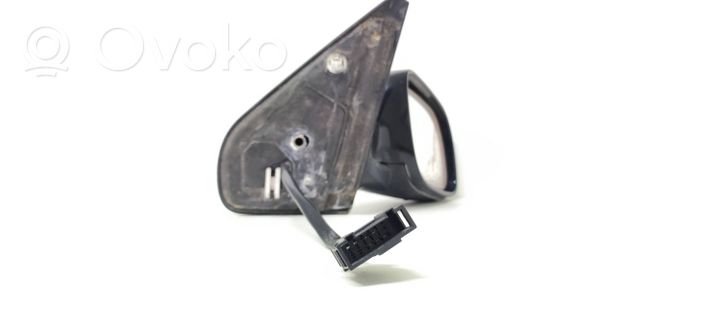 Volkswagen Golf IV Front door electric wing mirror E1010515