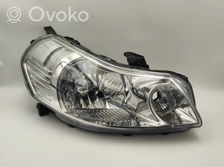 Suzuki SX4 Lampa przednia 10016684