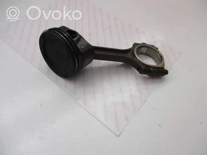Opel Astra J Piston with connecting rod 