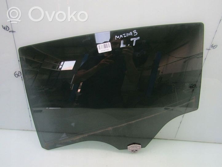 Mazda 3 Rear door window glass 