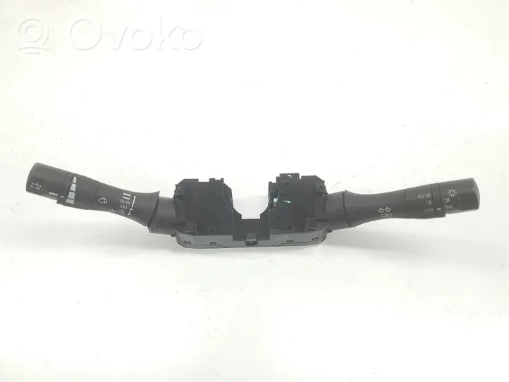 Nissan Juke I F15 Ohjauspyörän painikkeet/kytkimet 255603NL0B