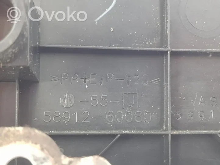 Toyota Land Cruiser (J120) Podłokietnik tunelu środkowego 5891060020E0