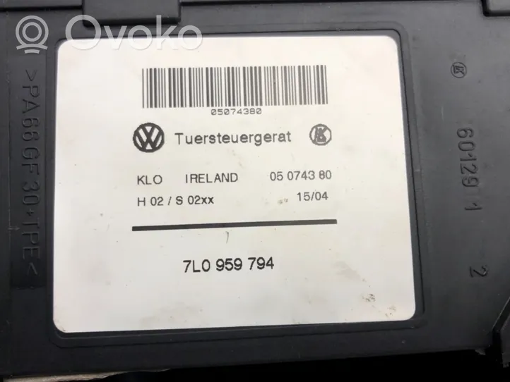 Volkswagen Touareg I Alzacristalli della portiera posteriore con motorino 7L0959794