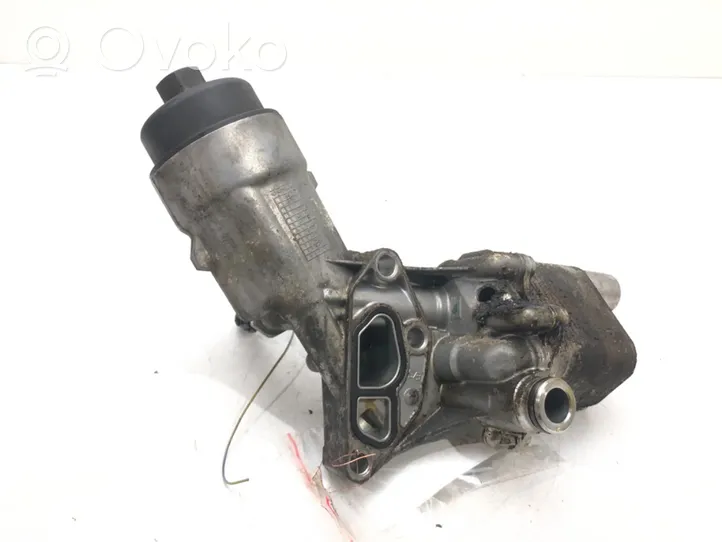 Opel Astra J Supporto di montaggio del filtro dell’olio 55566784