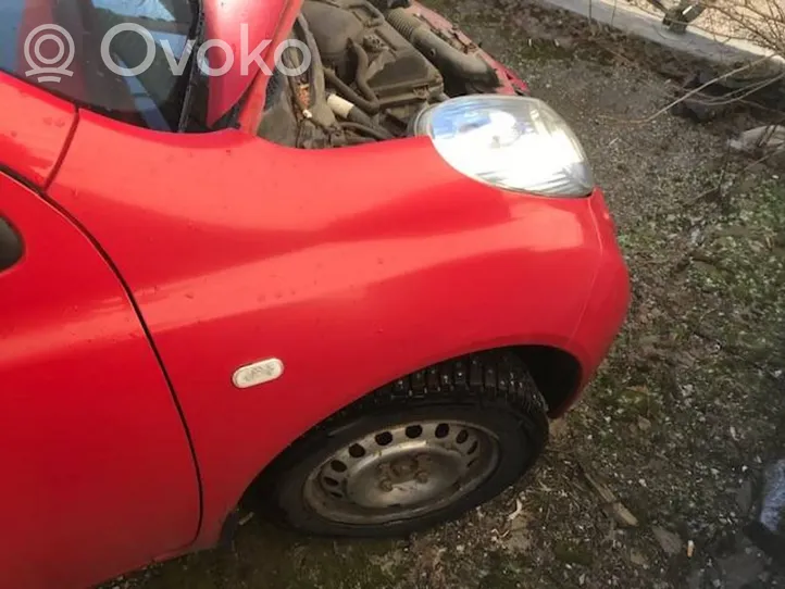 Nissan Micra Błotnik przedni 