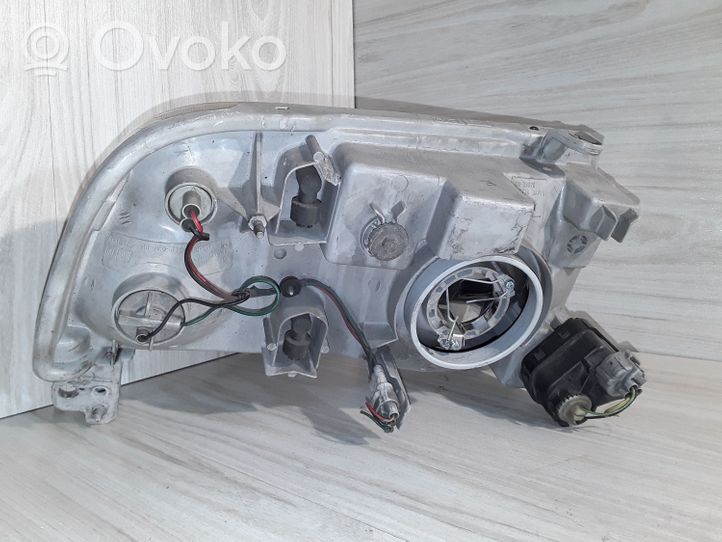 Suzuki Grand Vitara I Phare frontale 10032080