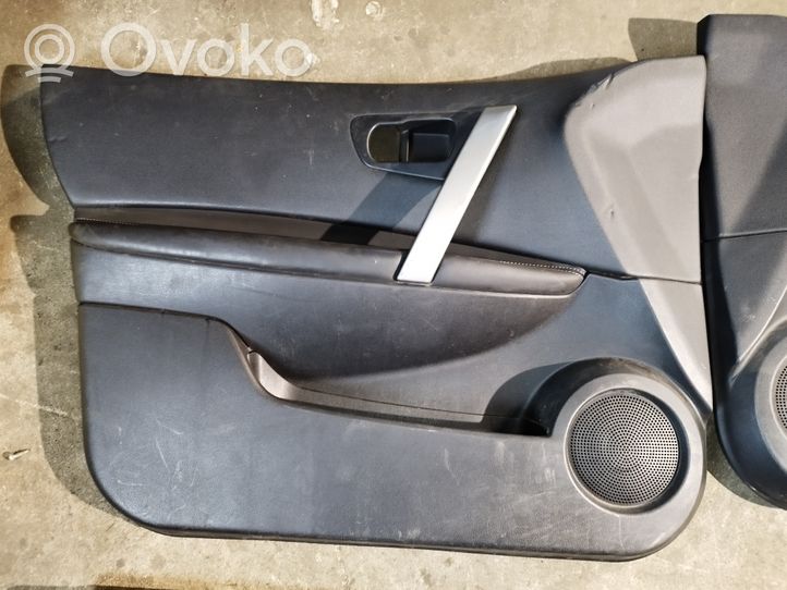 Nissan Qashqai+2 Boczki / Tapicerka drzwi / Komplet 
