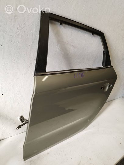 KIA Carens III Rear door 