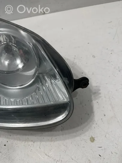 Volkswagen Golf V Lampa przednia 1K6941006R