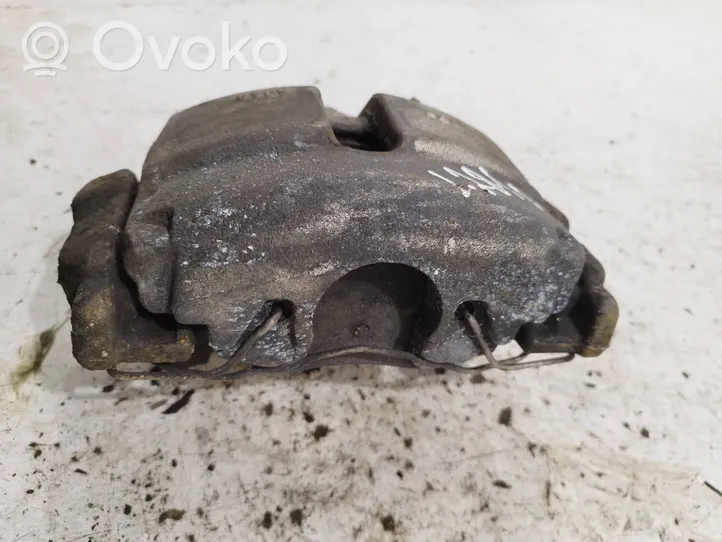 Volkswagen PASSAT B7 Front brake caliper 