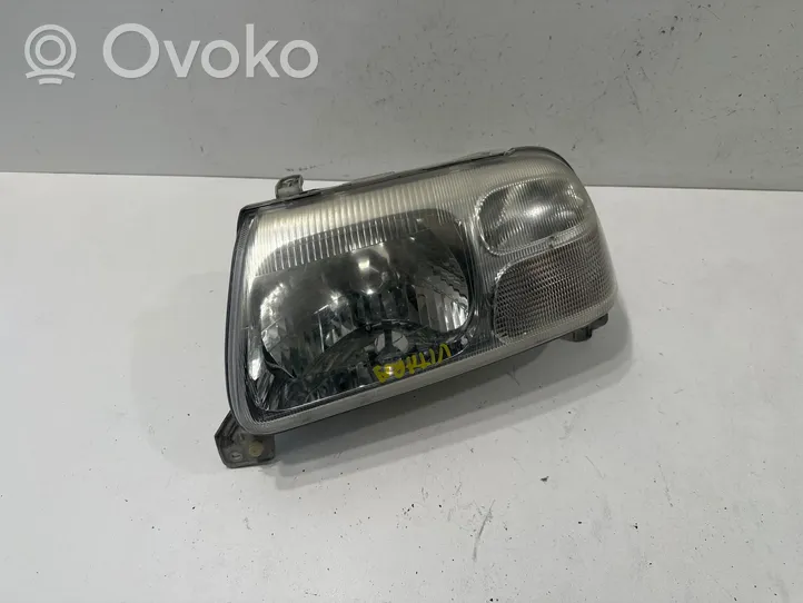 Suzuki Grand Vitara I Phare frontale 10032078