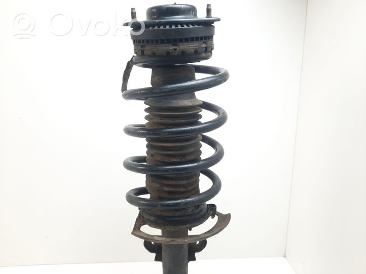 Chrysler Voyager Front shock absorber with coil spring 04743988AC