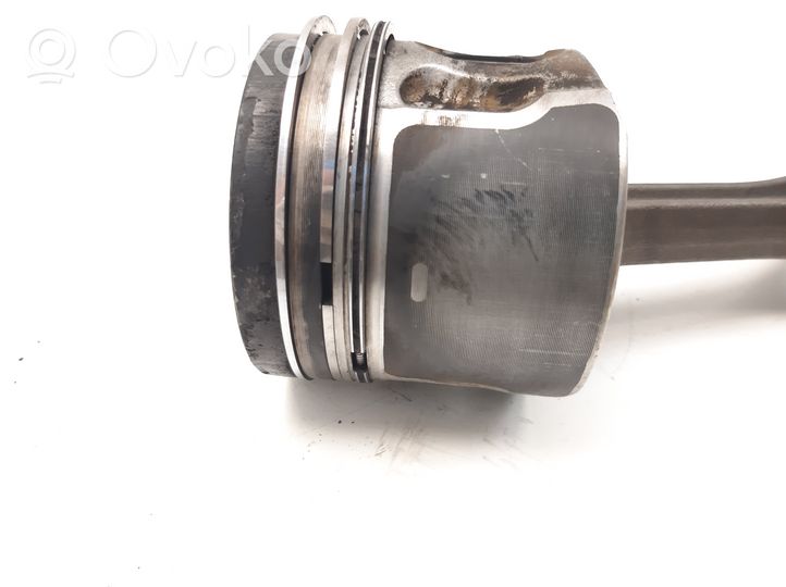 Volkswagen Caddy Piston with connecting rod 144514