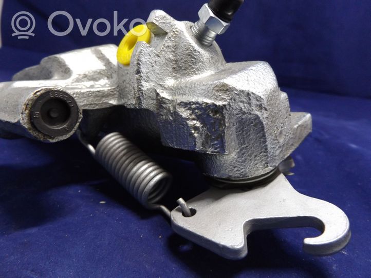 Nissan Sunny Caliper del freno trasero 0986473091