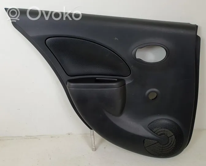 Nissan Micra Apmušimas galinių durų (obšifke) 82923