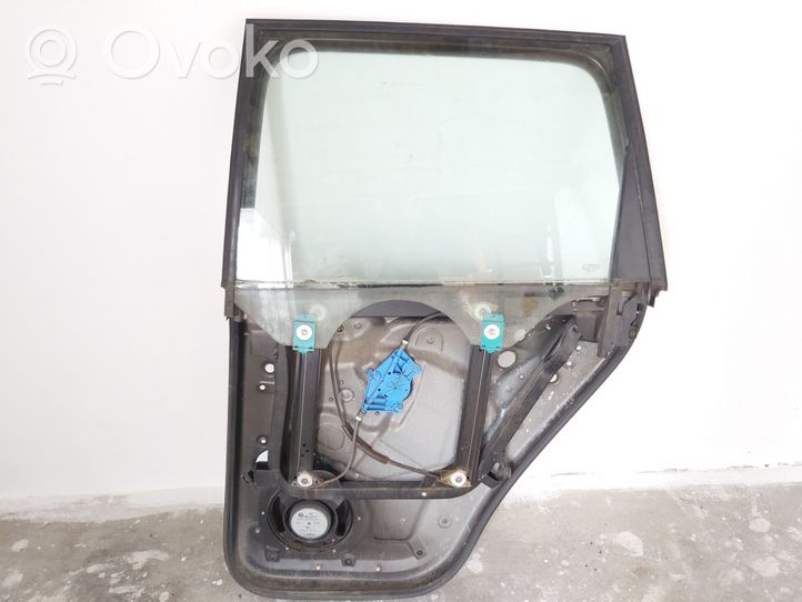 Volkswagen Touareg I Rear door window/glass frame 993464108