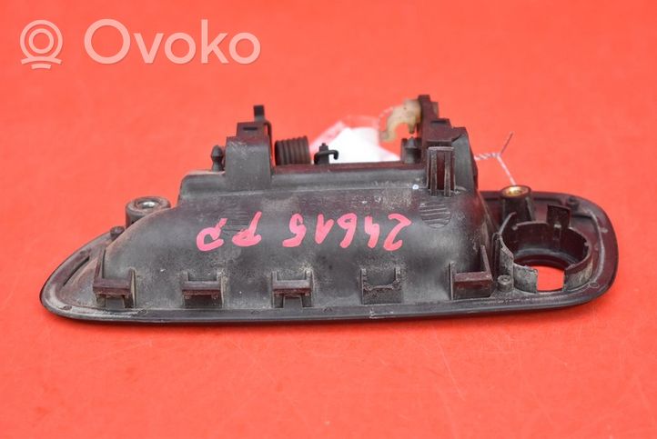 Toyota Carina T190 Klamka zewnętrzna drzwi przednich 69210-05010