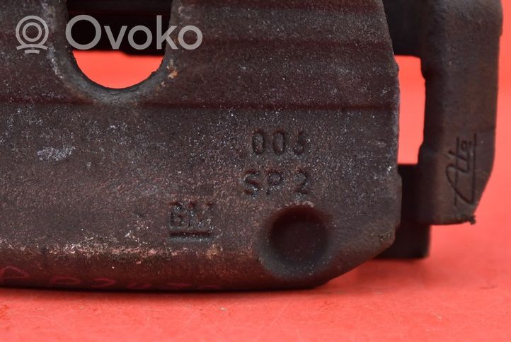 Opel Corsa E Caliper de freno delantero 