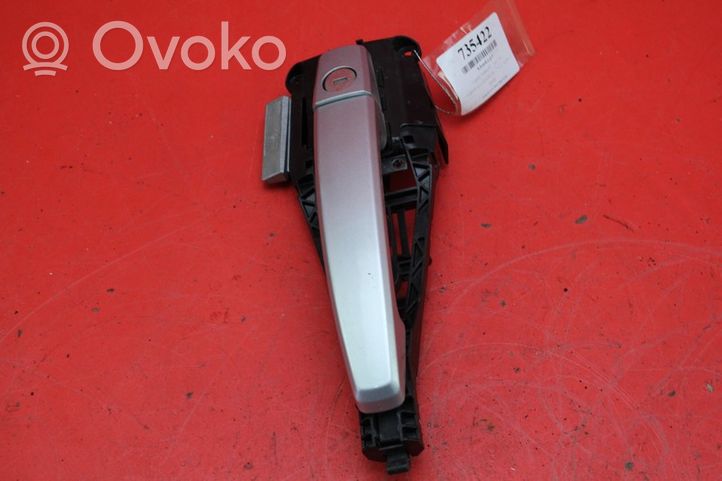 Opel Astra J Front door exterior handle 14096201