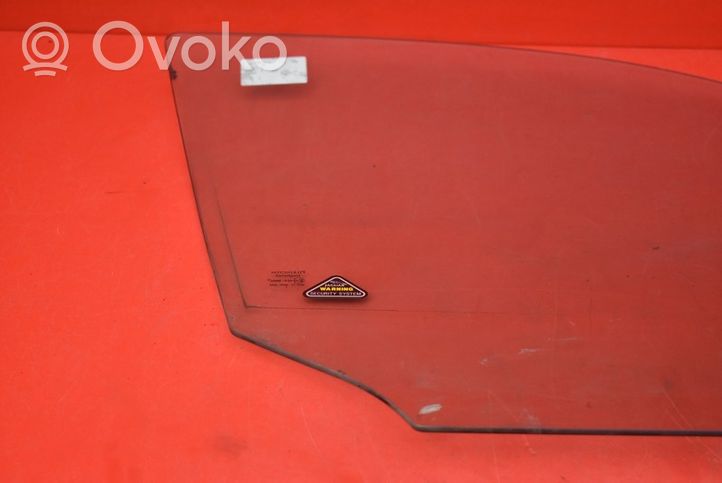 Jaguar S-Type Front door window glass four-door 