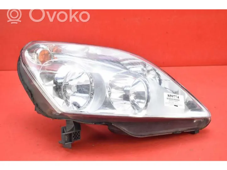 Opel Zafira B Lampa przednia 0000