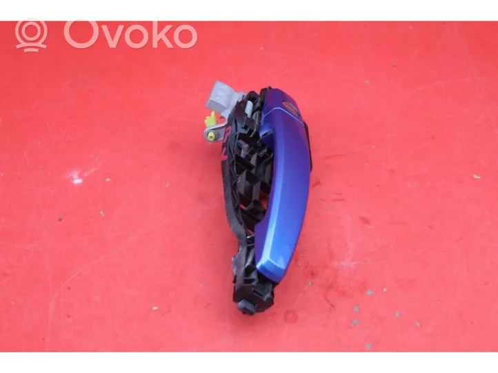 Opel Zafira B Klamka zewnętrzna drzwi przednich 24463523