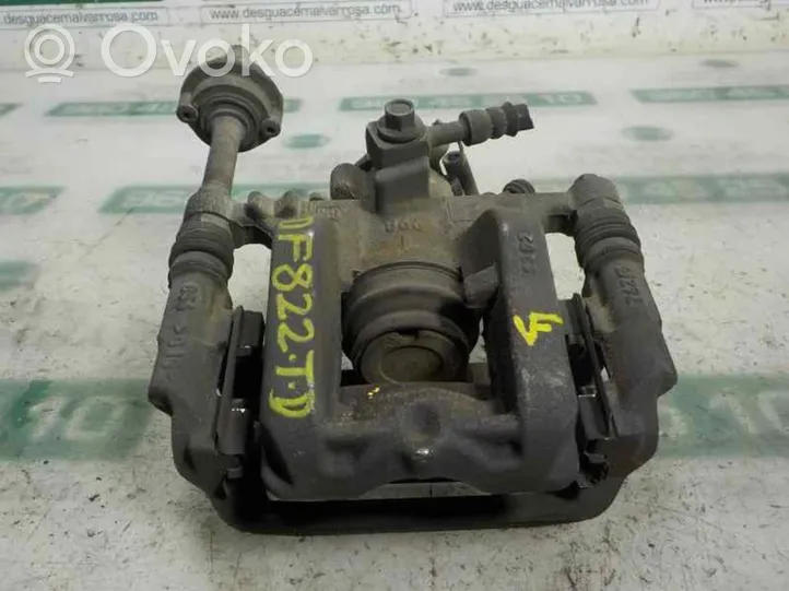 Opel Astra J Supporto della pinza del freno posteriore 13300864