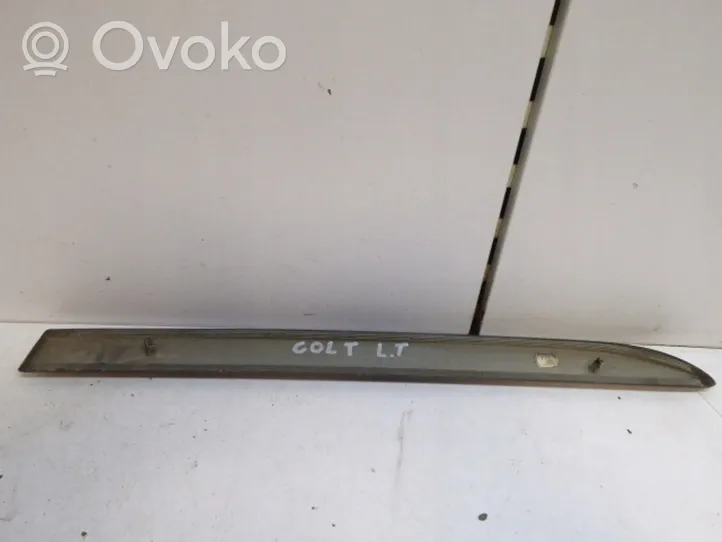 Mitsubishi Colt Rear door trim (molding) MR957271