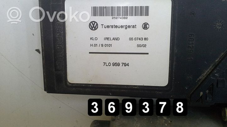 Volkswagen Touareg I Etuoven ikkunan nostin moottorilla 7L0959794