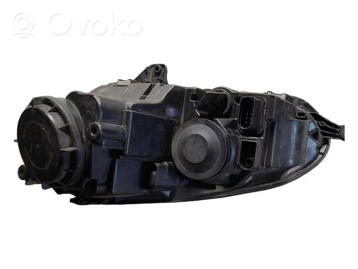 Volkswagen Golf V Lampa przednia 1K6941006P