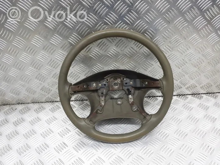 KIA Carens I Руль OK24T32980