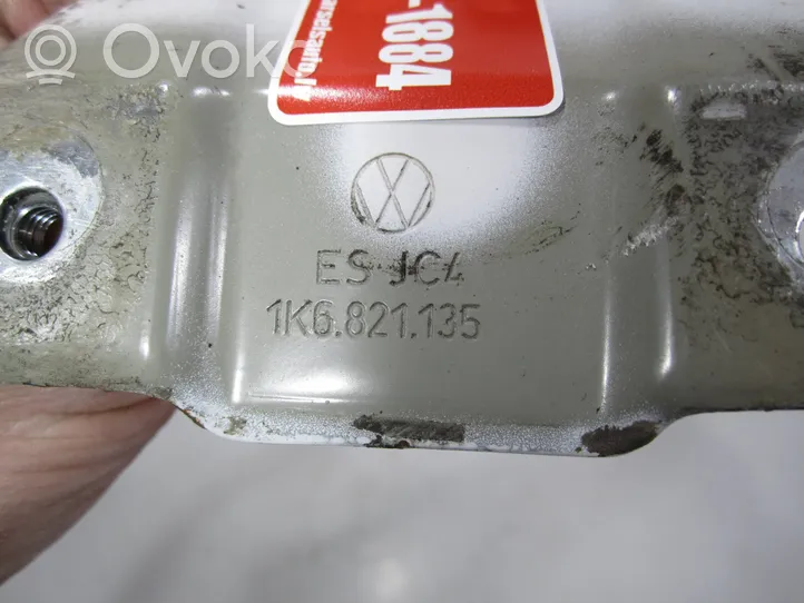 Volkswagen Golf V Uchwyt / Mocowanie błotnika przedniego 1K6821135