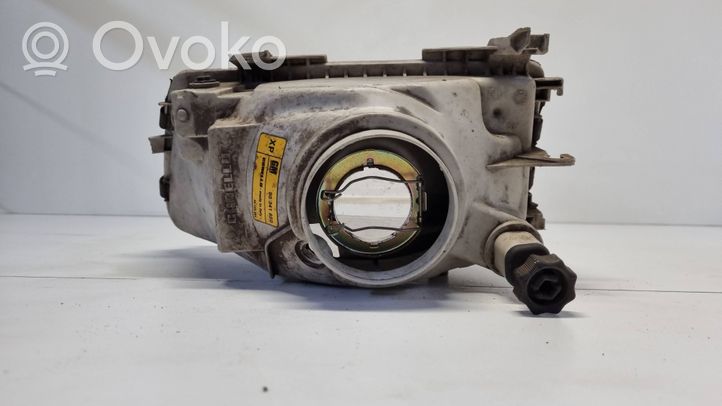 Opel Astra F Support phare frontale 90341850