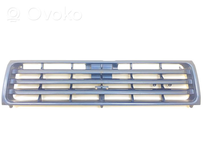 Mitsubishi Pajero Grille calandre supérieure de pare-chocs avant MB64572021