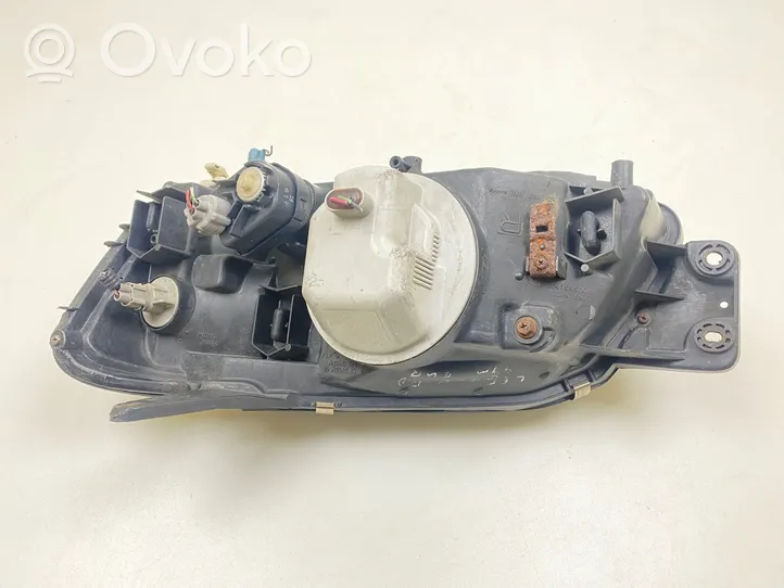 Subaru Legacy Передняя фара 10020653