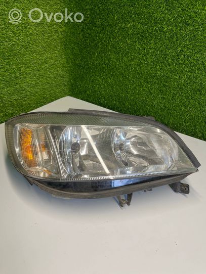 Opel Zafira A Lampa przednia 89100055