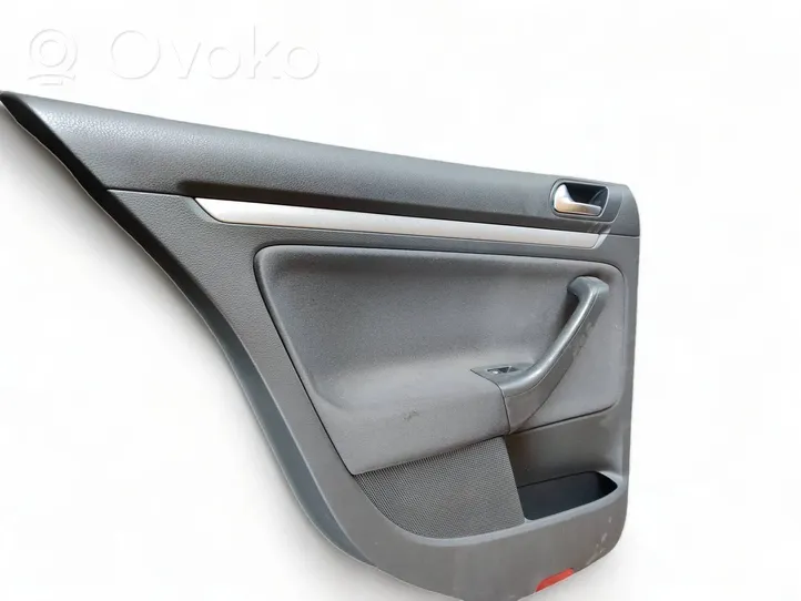 Volkswagen Jetta V Rivestimento del pannello della portiera posteriore 1K4867487