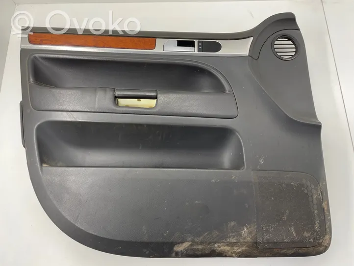 Volkswagen Touareg I Front door card panel trim 