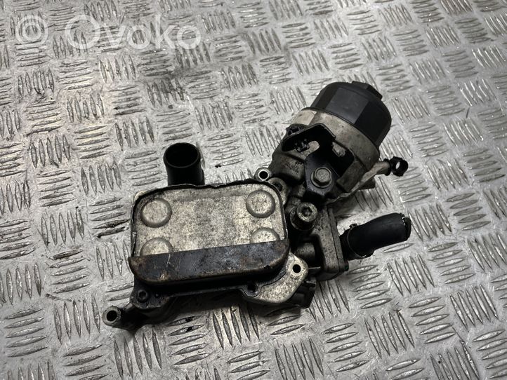 Opel Astra J Supporto di montaggio del filtro dell’olio 55213468