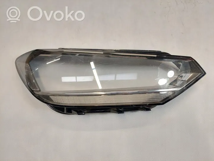 Volkswagen Touran II Headlight lense 1403000060