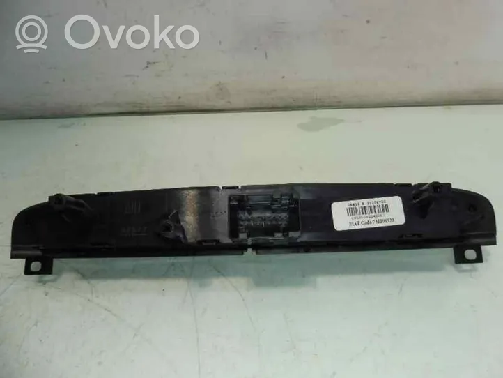 Fiat Grande Punto Przycisk świateł awaryjnych 735506939