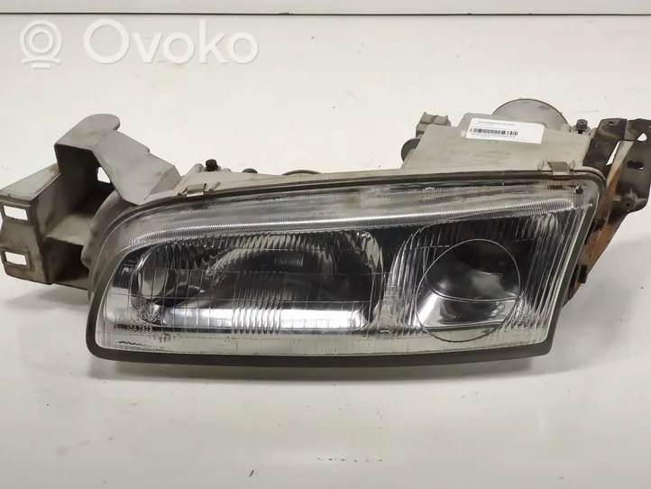 Mazda 626 Phare frontale 10061615