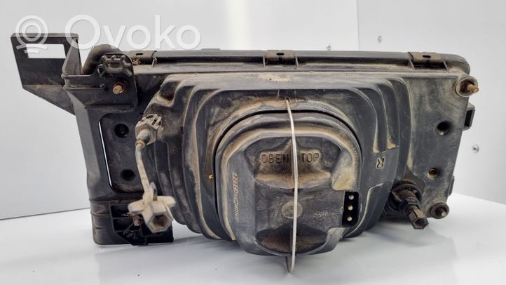 Volvo 740 Lampa przednia 1305239009