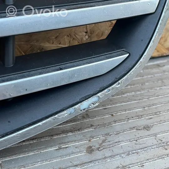 Volvo V70 Grille calandre supérieure de pare-chocs avant 31383595