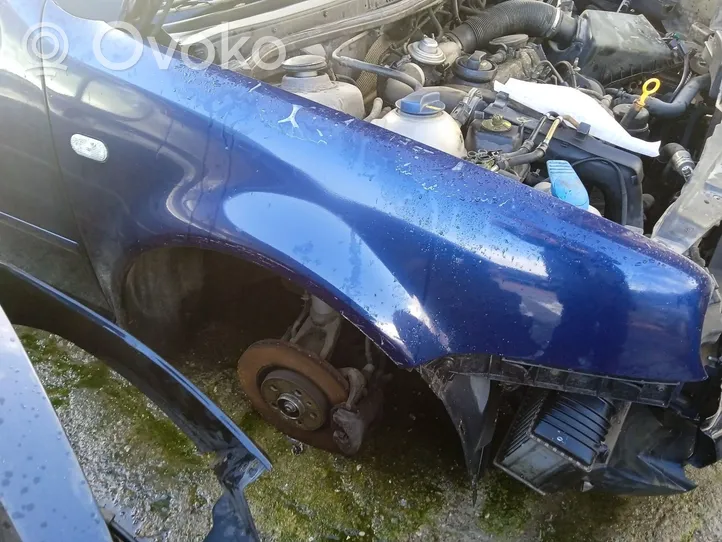 Volkswagen Golf SportWagen Błotnik przedni 1J0821022A