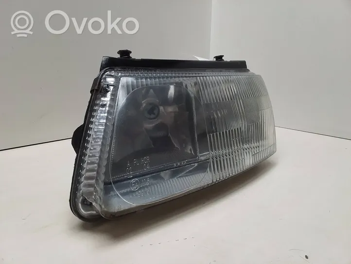 Volkswagen PASSAT B5 Headlight/headlamp 064411125L